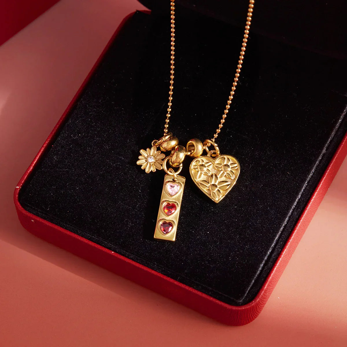Calliope Triple Heart Charm Necklace